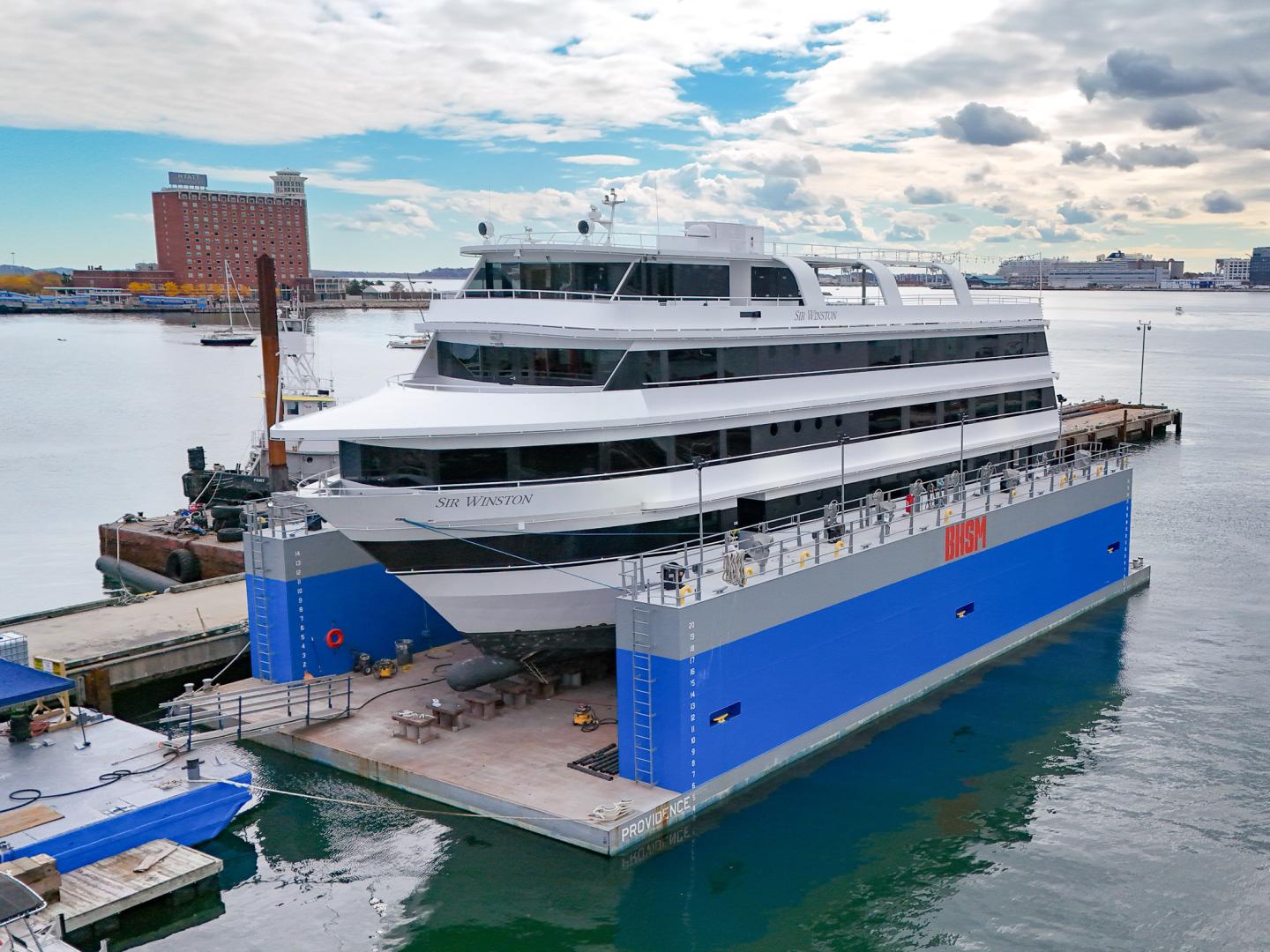Large ferry docked in the floating dry dock at Boston Harbor Shipyard & Marina.